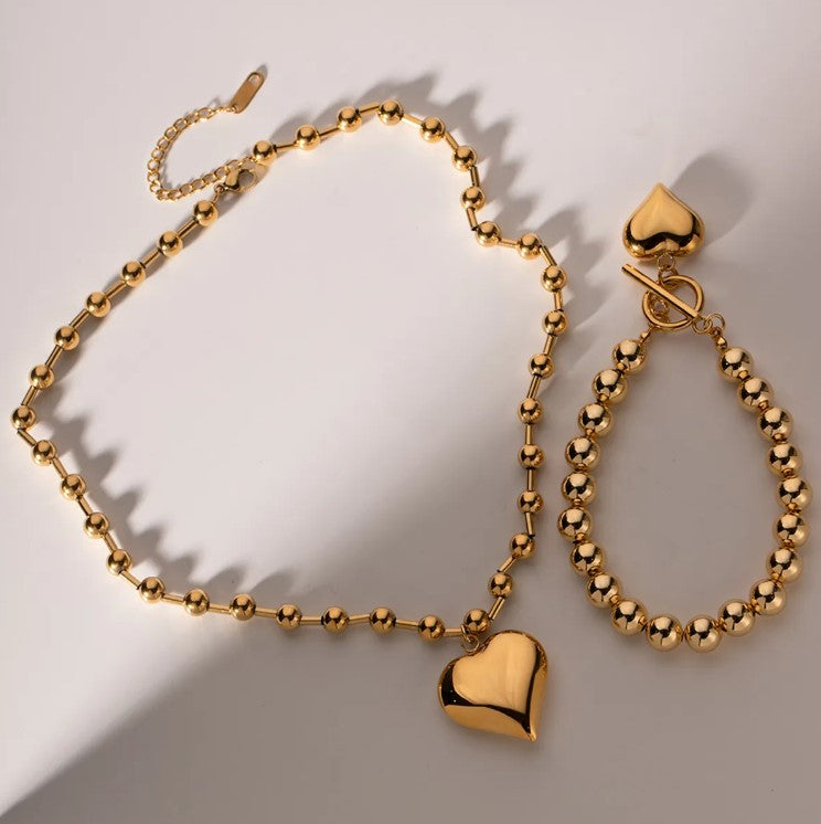 Pulseras de mano con  corazón chapa de oro 18 k