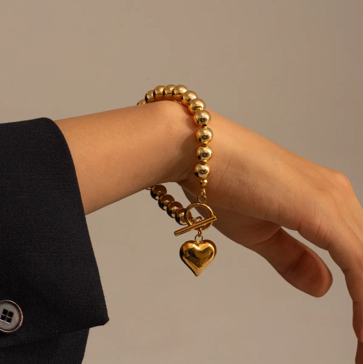 Pulseras de mano con  corazón chapa de oro 18 k